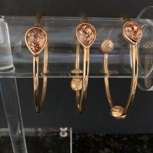 Set of 3 Gold Tone Bangle Bracelets/Pear Shaped Topaz Color Stones